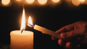What Does "Love Covers a Multitude of Sins" Mean? 1 Peter 4:8 candle lighting another candle (love covers all)